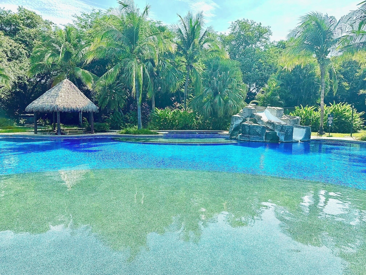Segovia pool with palapa and slide